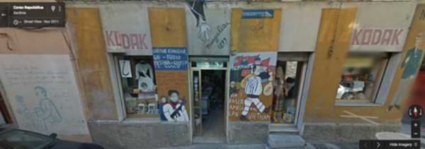 Screen Grab of Google Street View of a mural Depicting American fascists in Vietnam on Corso Repubblica. This mural is described in detail below in the text of this
          case study.