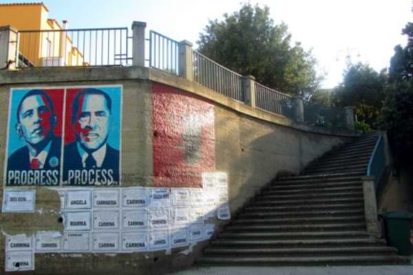 Screen Grab of Google Street View of the wall on Via Antonio Gramsci where the Obama-Berlusconi-Progress-Process Mural is located in Orgosolo. In this screenshot, the wall is bare.