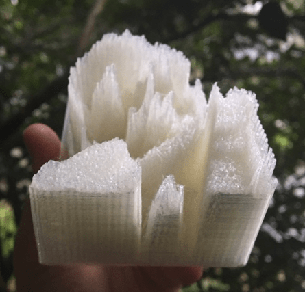 3D printed tactile lithophanes of President Barack Obama. One image depicting a side view and one showing the front view